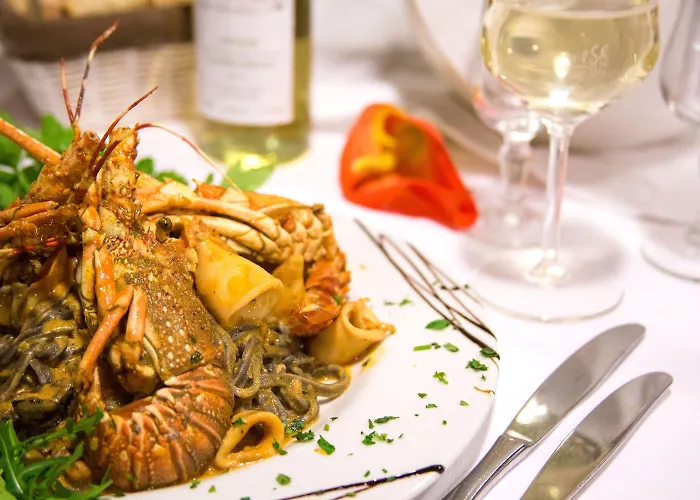 Отель Ristorante La Perla 4*