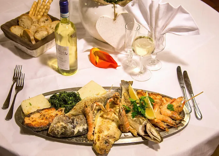 Отель Ristorante La Perla 4*